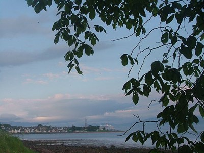 QM2 passes the town on the way to Invergordon