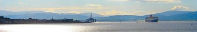 Panorama showing Cromarty, a rig and the QM2