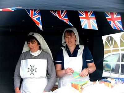 Fiona and Friend selling baguettes.