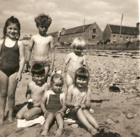 Johnston & Reid kids on the beach.