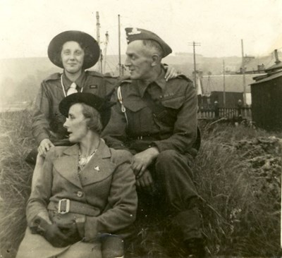 Kathleen, Tom and Ethel Lewis on the links