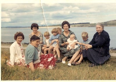 Catherine Bathie, with Mrs. Reid and her daughters