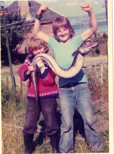 Willie Nicolson and Billy Thompson with a massive conger eel