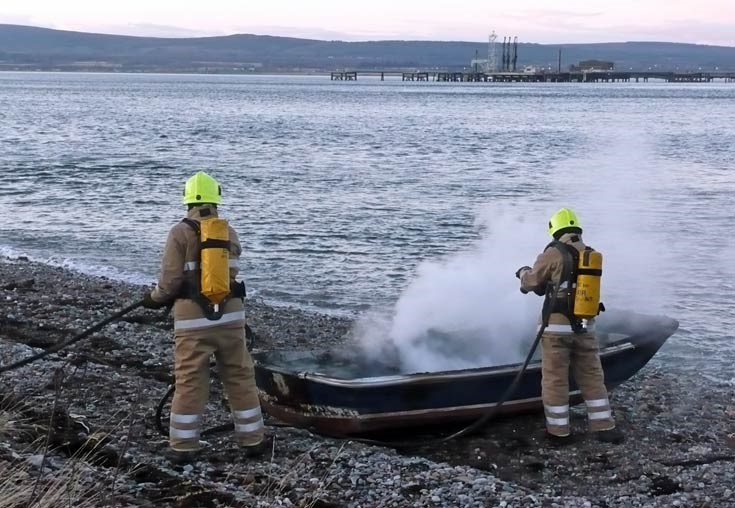 Oops. Ronald's boat gets a shower