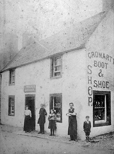 Mr Fraser in front of Shoe Shop with Family?