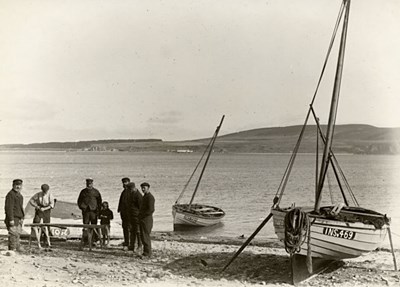 Fishermen on the beach - c1909