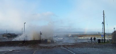 Waves Breaking over the Harbour