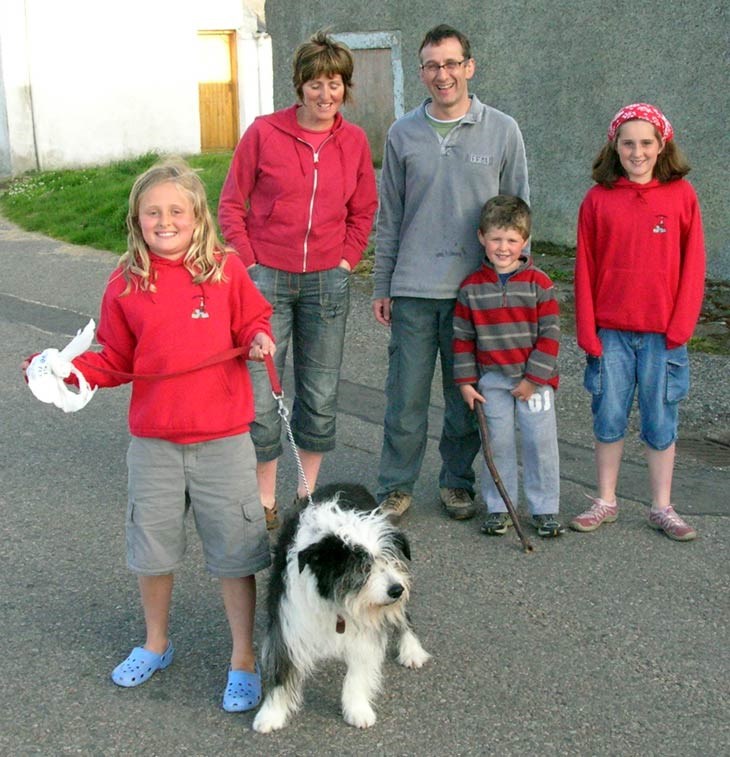 Queenie with Andy McCann and family