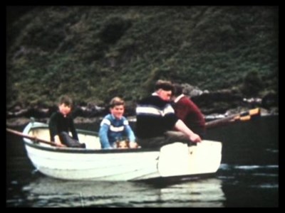 Lads in rowing boat