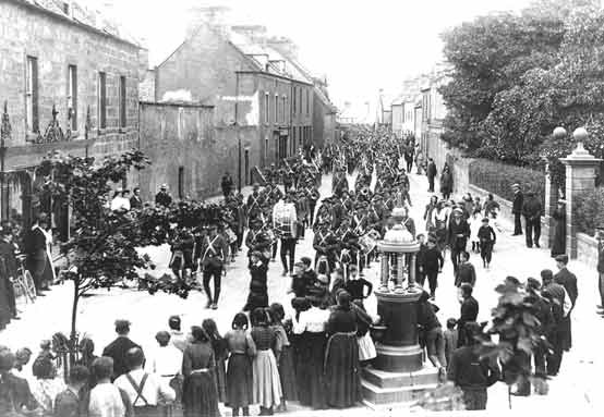 Military Procession in High St - c1910