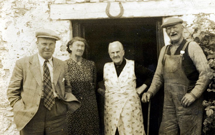 Unknown people in doorway at Rosefarm - c1950