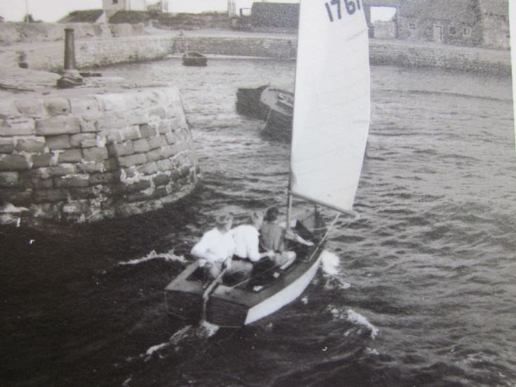 Dinghy in the harbour, c1960.