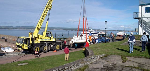 Yachts being lifted from Cromarty Harbour