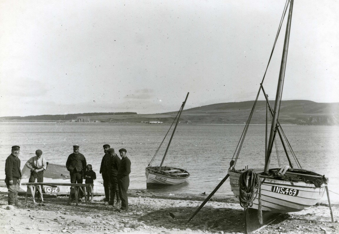 Fishermen on the beach - c1909
